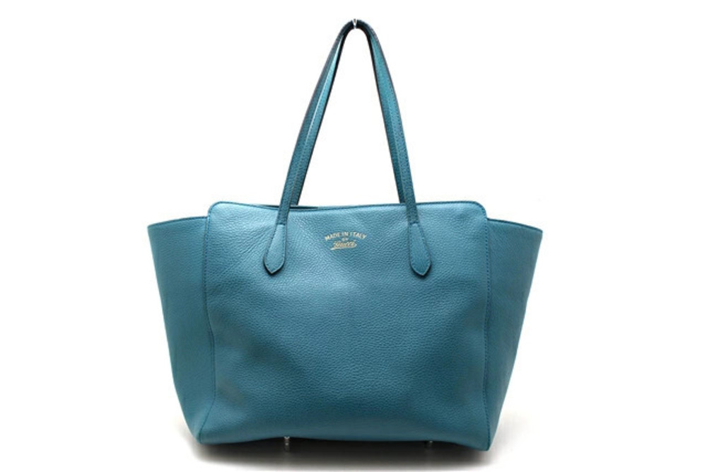 Gucci embossed leather tote bag blue